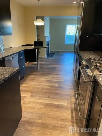 a room with furniture and a flat screen tv