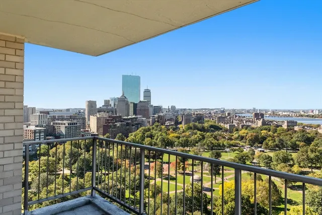 a view of a city skyline from a balcony
