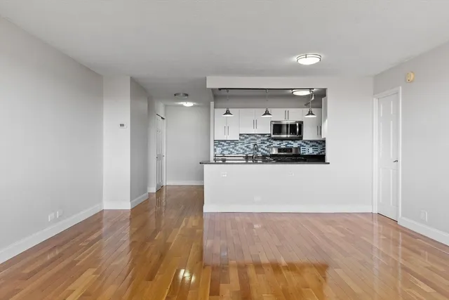 a view of kitchen and front door
