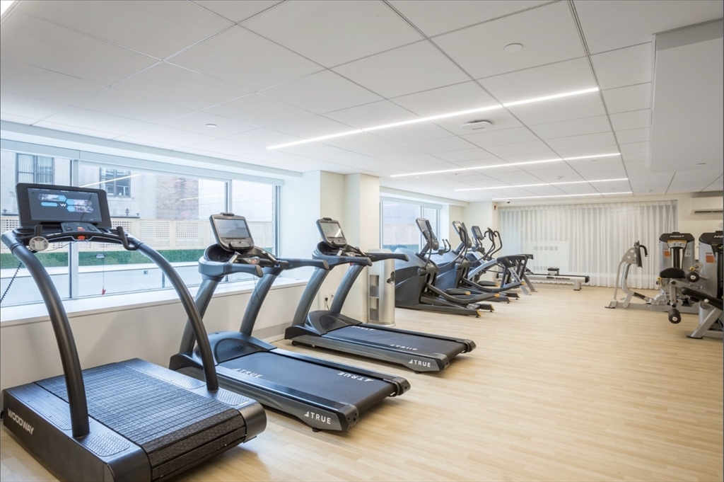 151 Tremont Street, Unit 24P Boston, MA 02111 - Photo 37 of 38 a view of a room with gym equipment