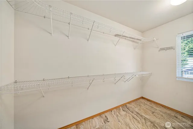 a view of a room with racks on the wall