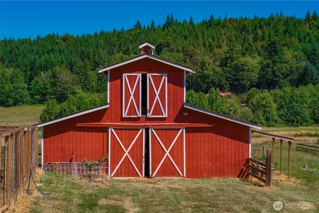 a front view of a house with yard