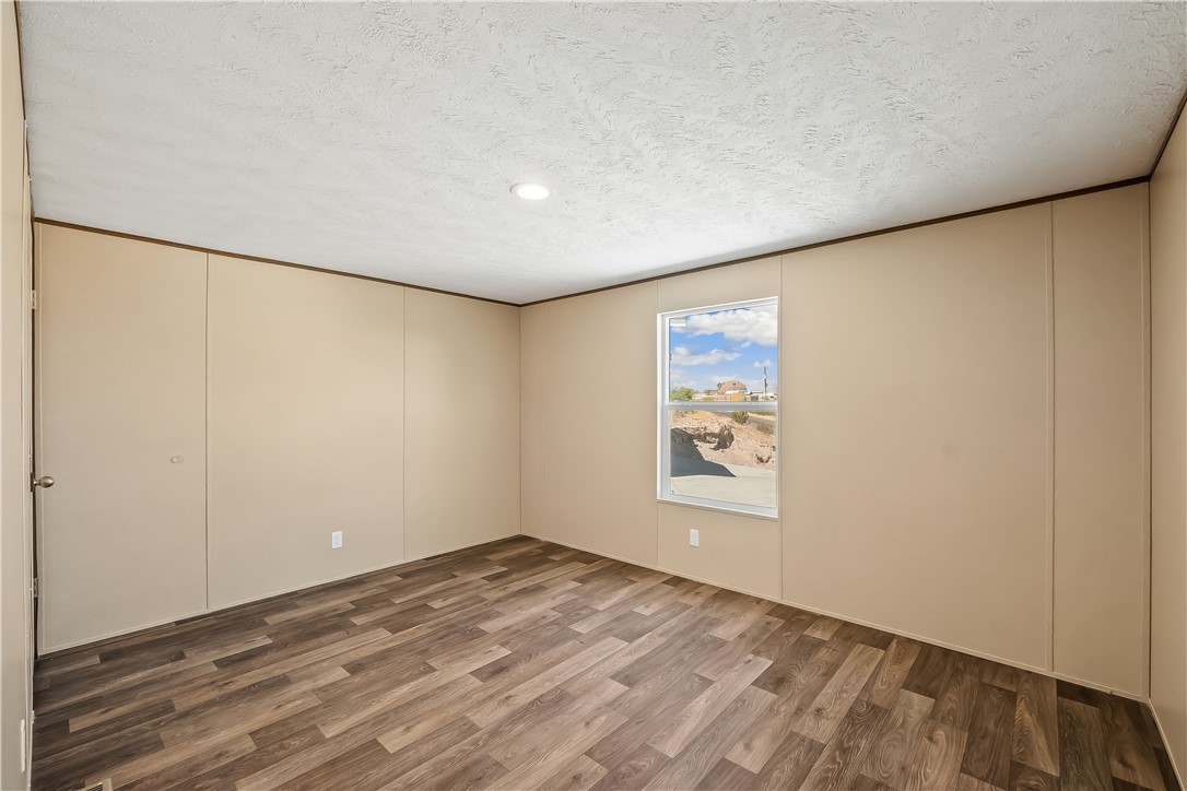 13205 South Water Reed Way Topock, AZ 86436 - Photo 27 of 37 an empty room with windows