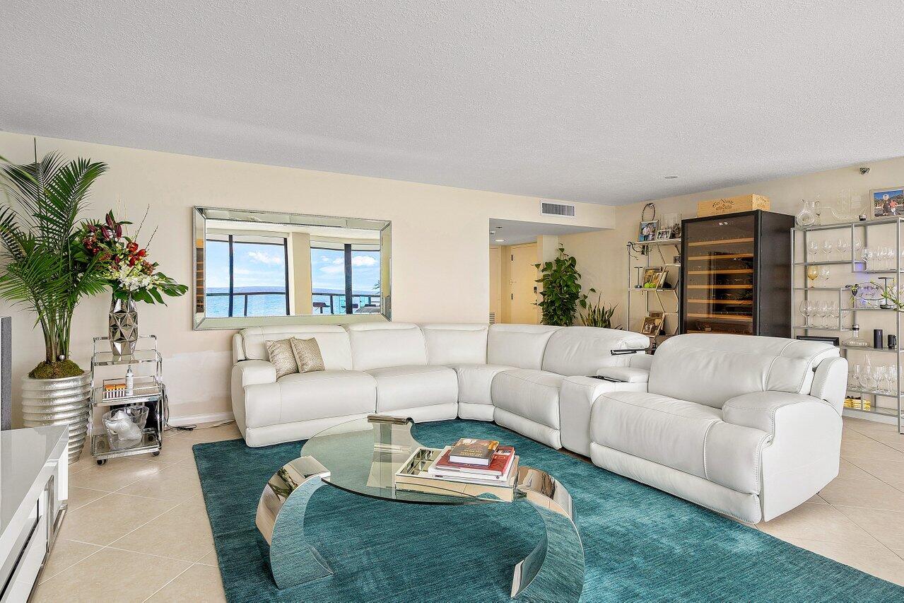 250 South Ocean Boulevard, Unit 10C Boca Raton, FL 33432 - Photo 4 of 33 a living room with furniture and a large window