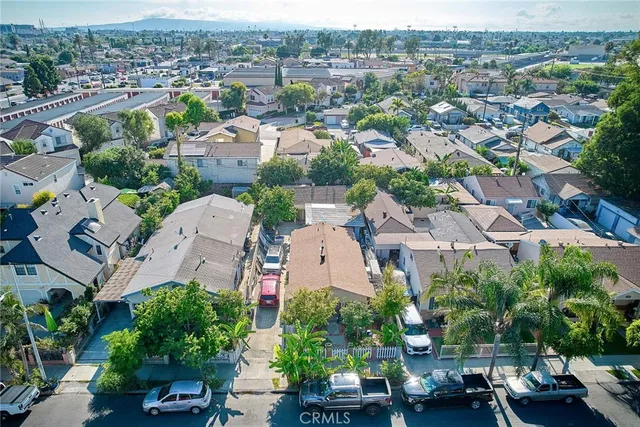 an aerial view of a city with lots of residential buildings
