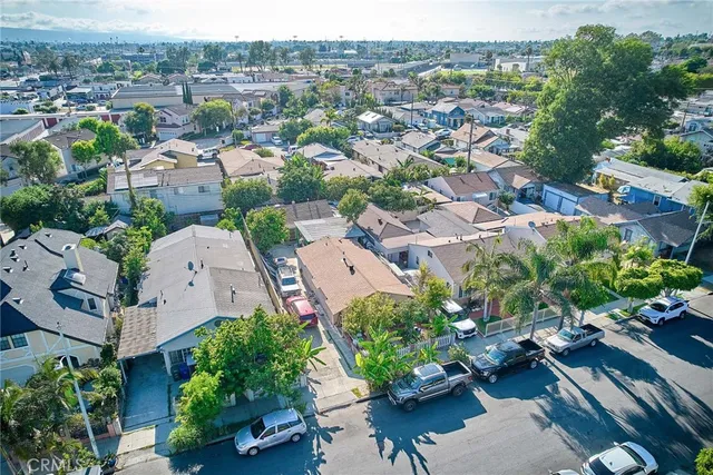 an aerial view of a house with a garden