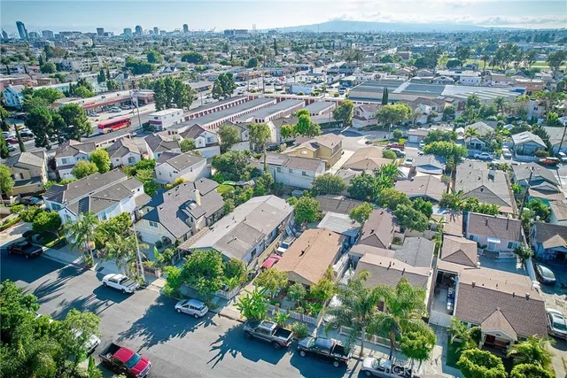 an aerial view of a city with lots of residential buildings