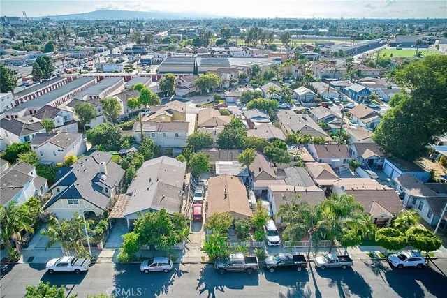 an aerial view of a city with lots of residential buildings
