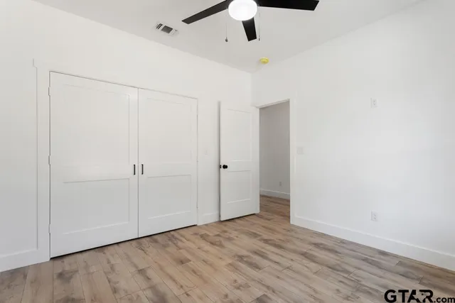 a view of an empty walk in closet