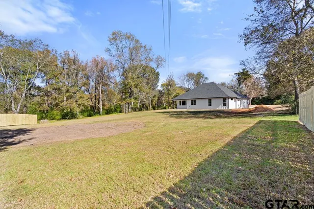 a view of an outdoor space and a yard