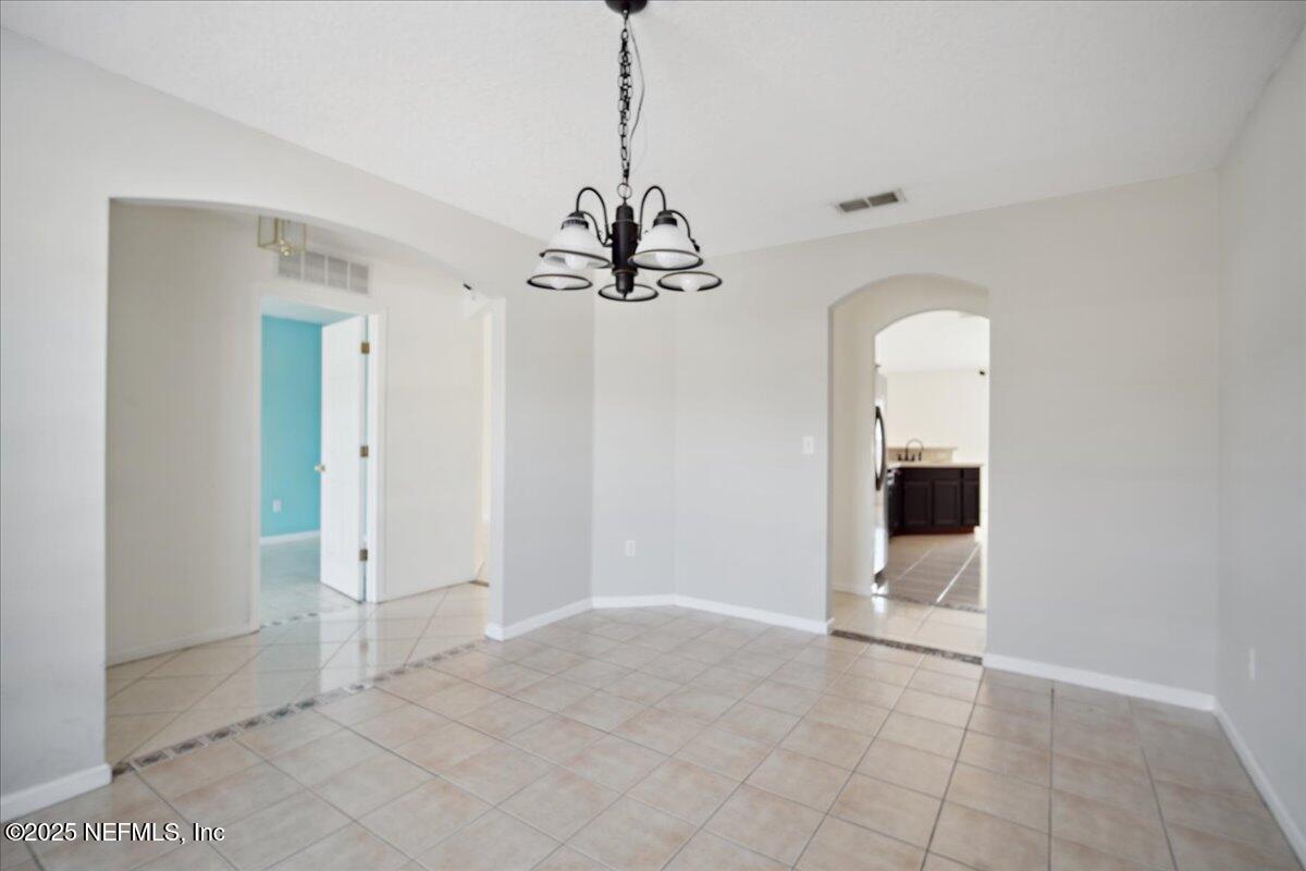 1672 Avenger Lane Jacksonville, FL 32221 - Photo 15 of 48 a view of a room with wooden floor