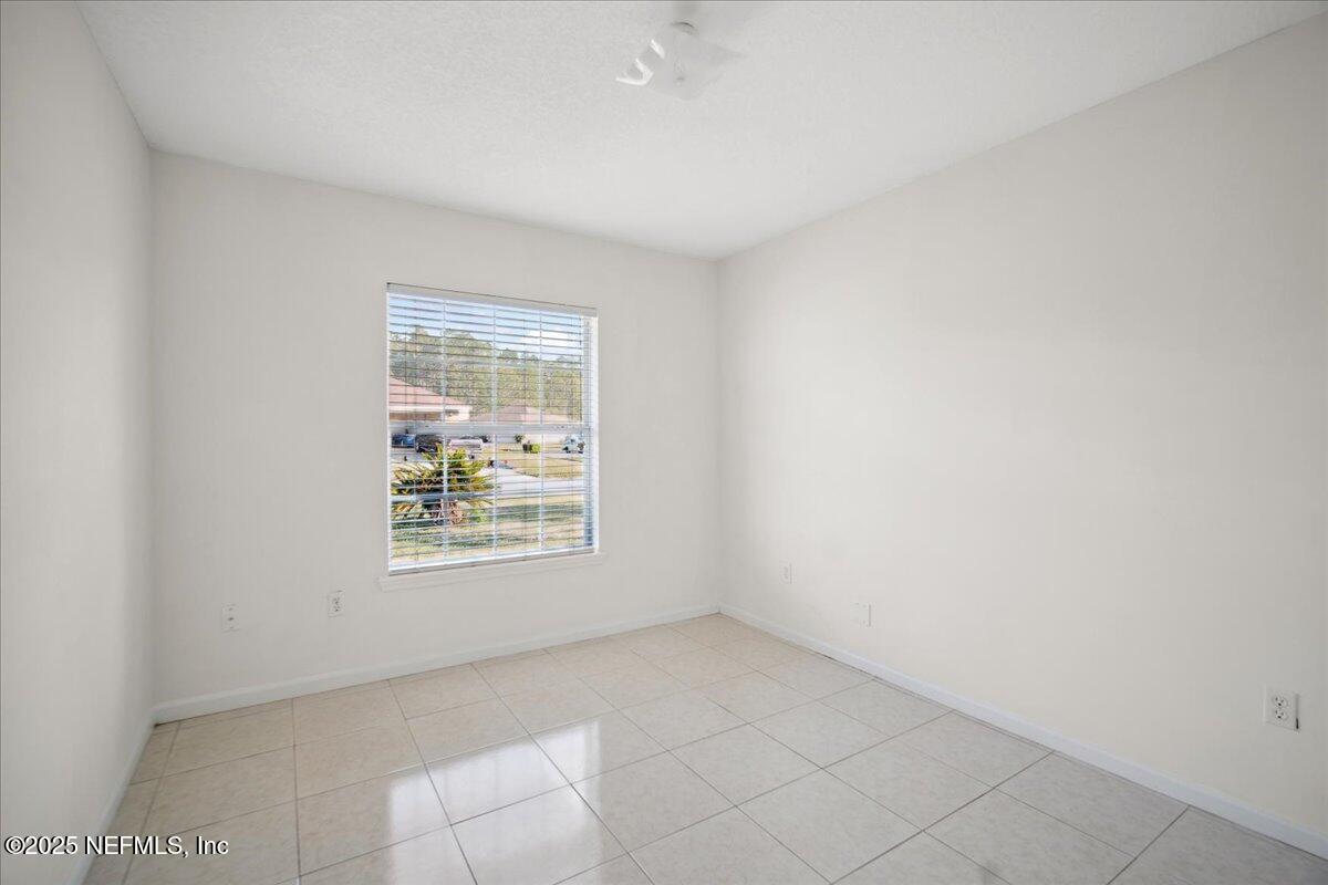 1672 Avenger Lane Jacksonville, FL 32221 - Photo 31 of 48 an empty room with windows