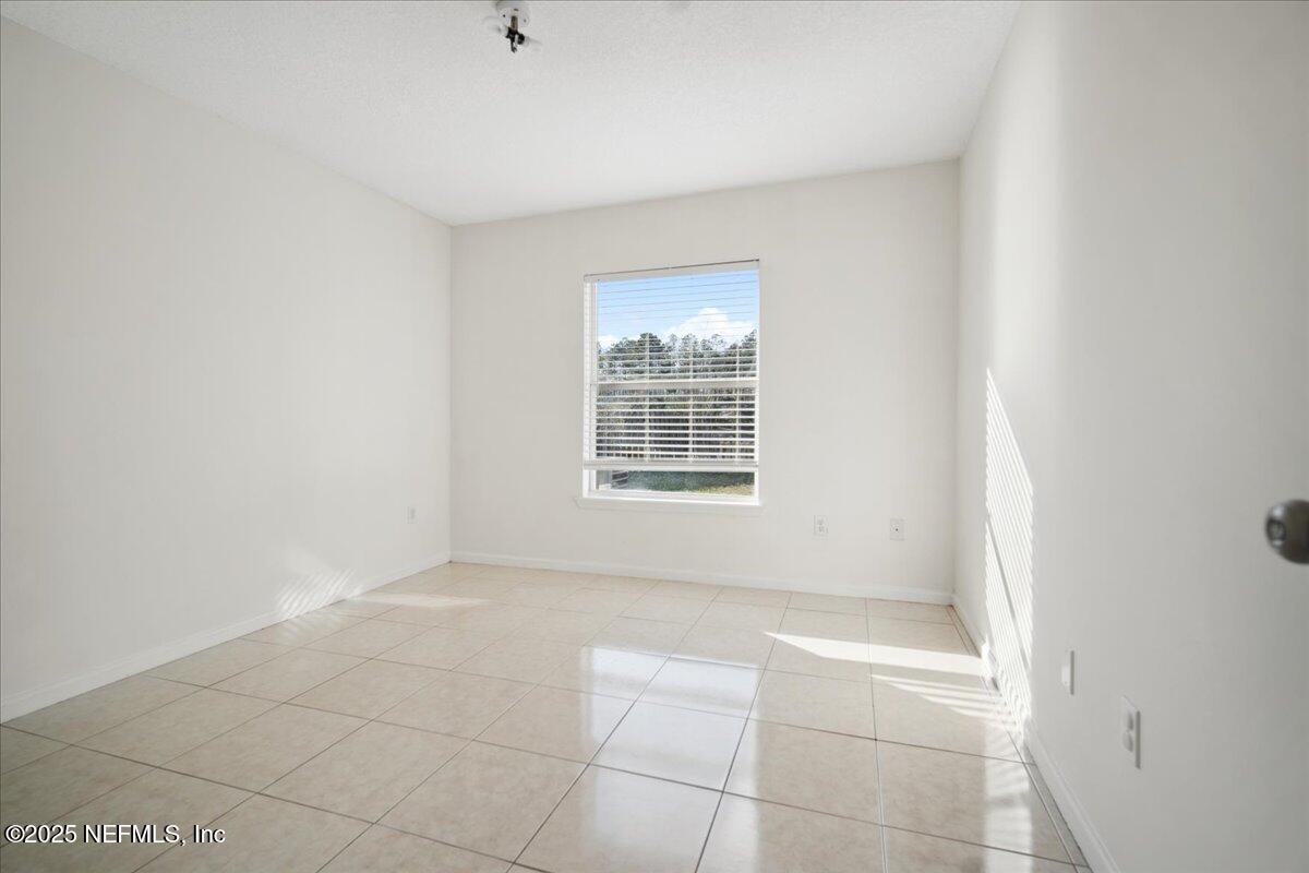 1672 Avenger Lane Jacksonville, FL 32221 - Photo 35 of 48 a view of an empty room with a window