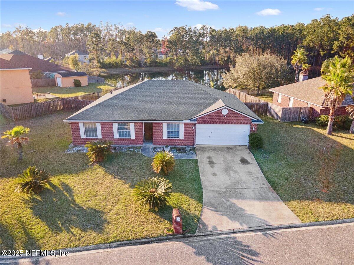 1672 Avenger Lane Jacksonville, FL 32221 - Photo 5 of 48 an aerial view of residential houses with outdoor space