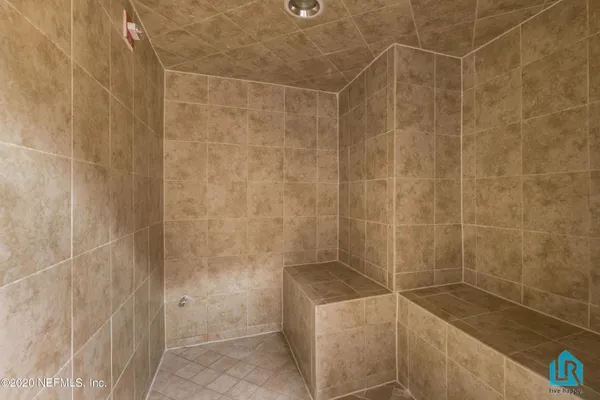 a view of a building with a swimming pool