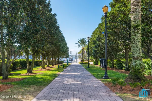 a front view of a building with garden