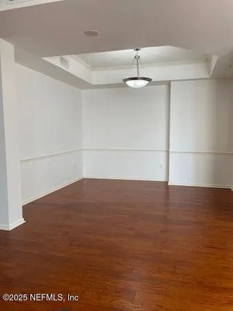 a kitchen with granite countertop a sink and a stove