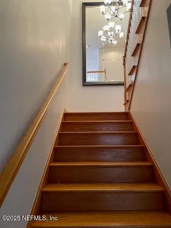 a spacious bathroom with a bathtub sink