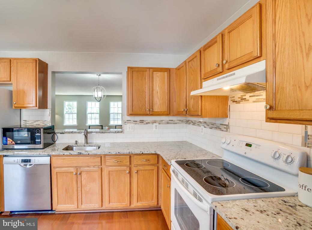 7314 Fountain Spring Court Springfield, VA 22150 - Photo 7 of 26 New Fridge New Dishwasher & Granite Counters