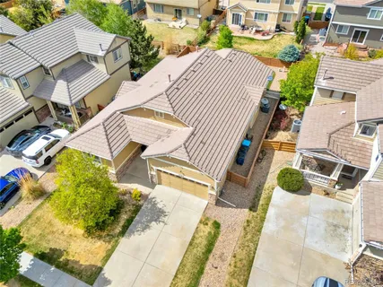 a aerial view of a house with swimming pool