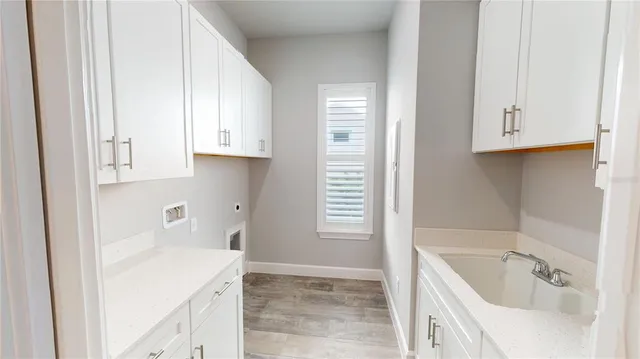 a view of cabinets and wooden floor