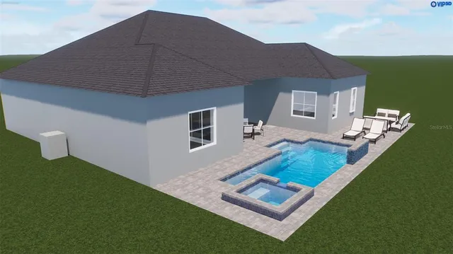 a aerial view of a house with a yard