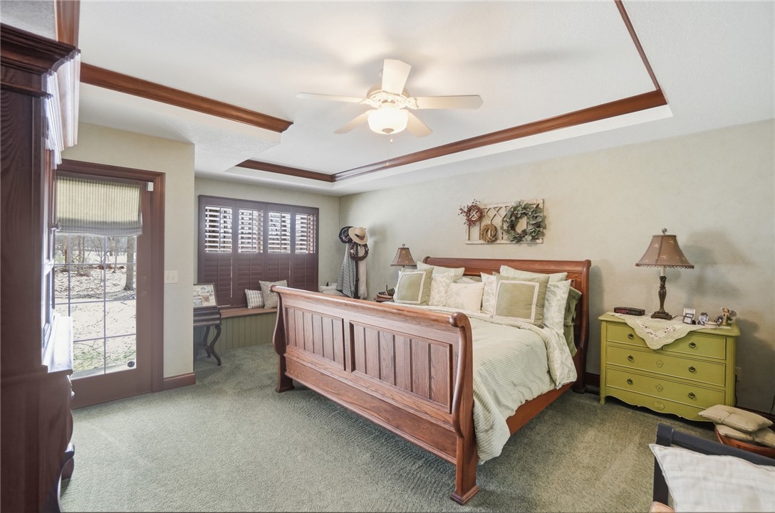 5300 Brookshire Lane Springfield, OH 45502 - Photo 25 of 56 This primary bedroom features a classic design with warm wood accents and abundant natural light.