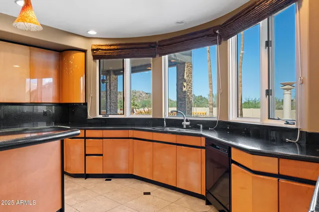 a living room with furniture and white table