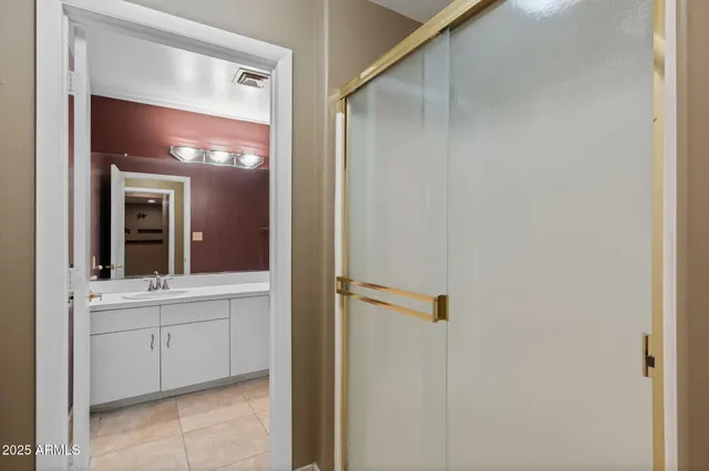 a view of a big house with a backyard