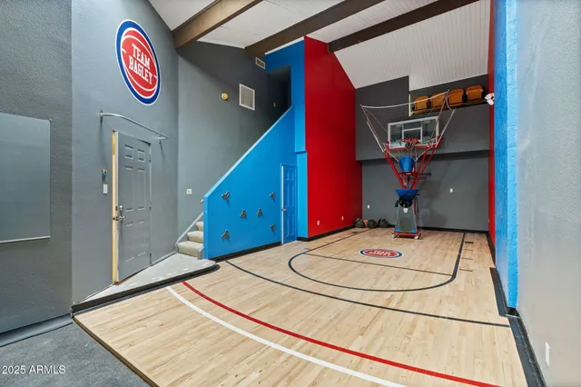 an aerial view of a house with garden space and street view