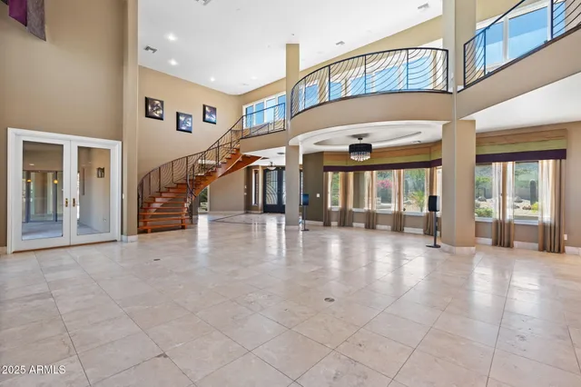 a kitchen with stainless steel appliances granite countertop a stove and cabinets