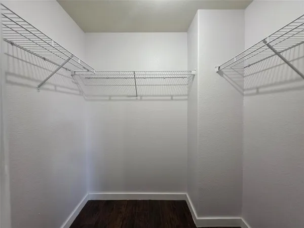 a view of small space with racks on the wall
