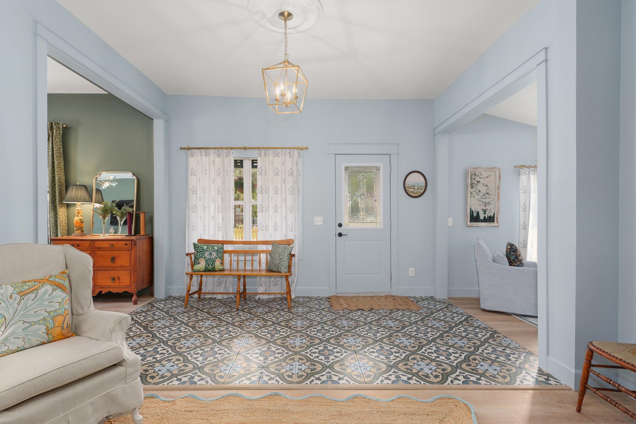 52 Spring Street St. Augustine, FL 32084 - Photo 12 of 45 a living room with furniture and a table