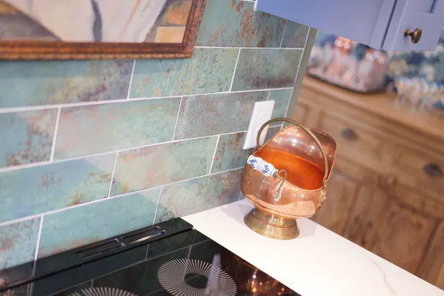 a kitchen with stainless steel appliances granite countertop a stove a sink dishwasher and cabinets with wooden floor