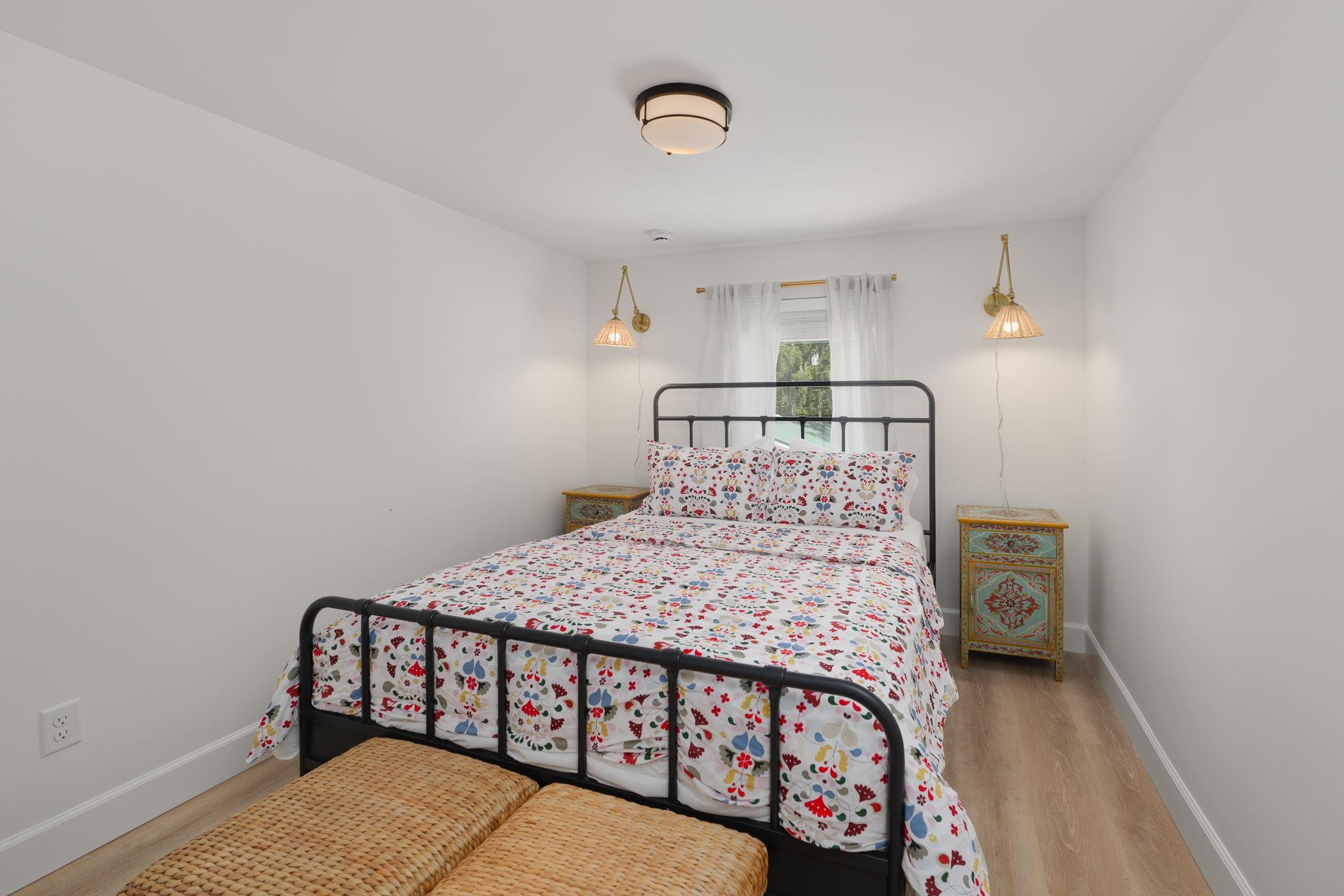 52 Spring Street St. Augustine, FL 32084 - Photo 37 of 45 a bedroom with a bed and a window