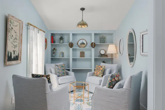 a living room with furniture and window