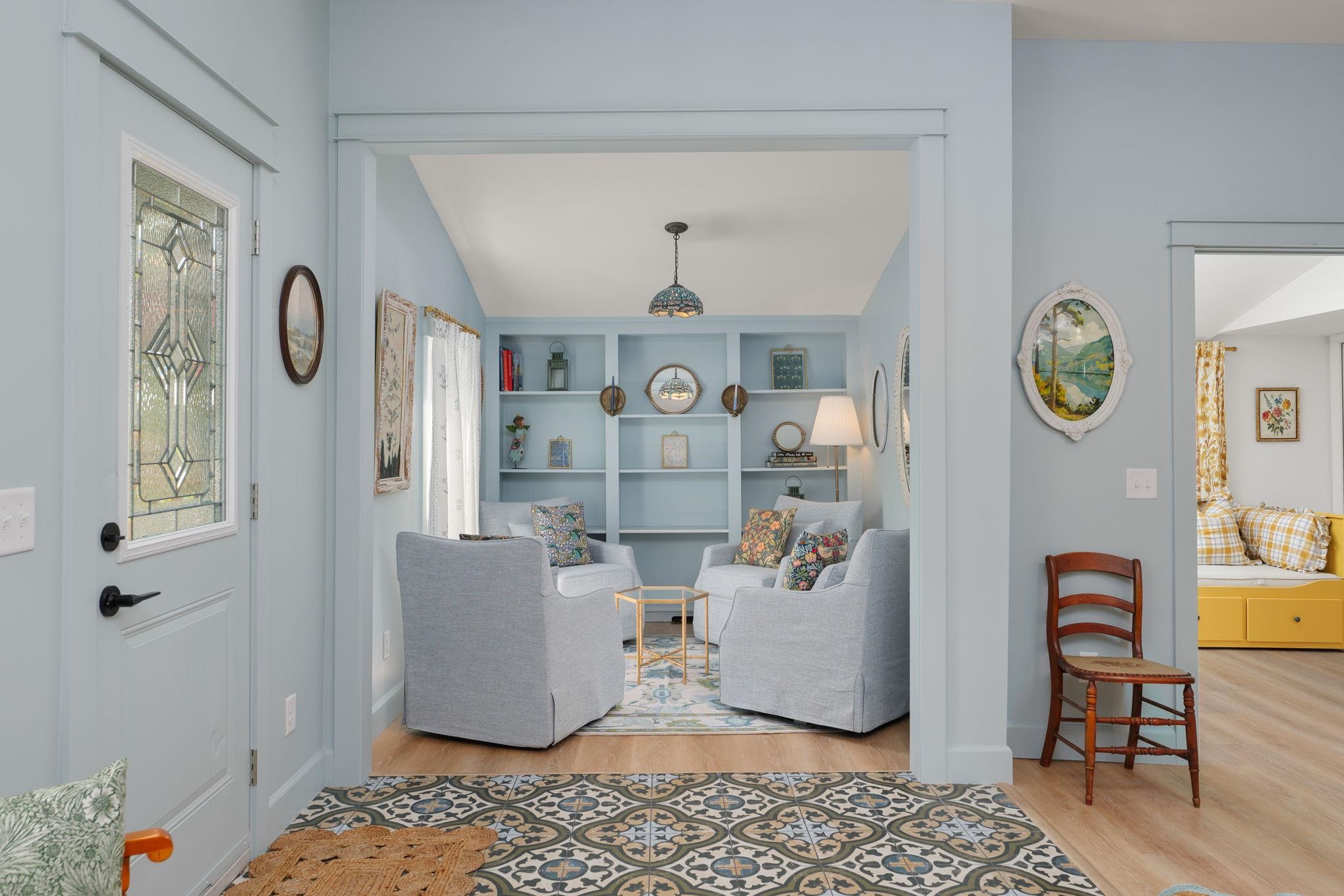 52 Spring Street St. Augustine, FL 32084 - Photo 8 of 45 a living room with a couch and a window