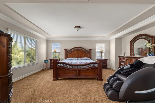 a view of a garden with a building in the background