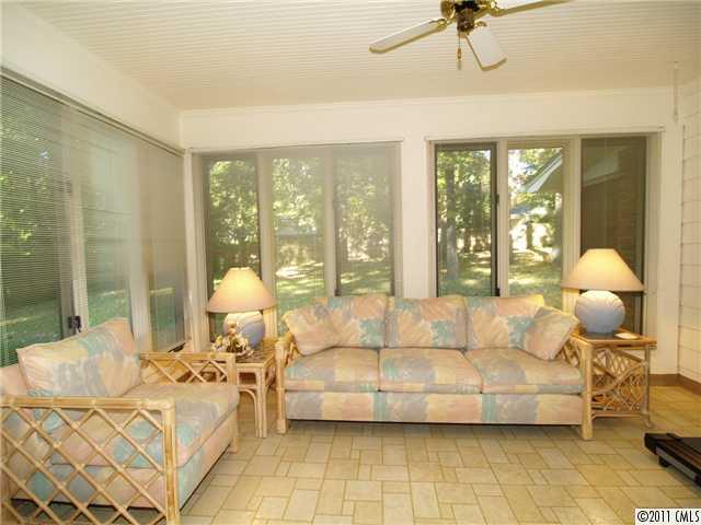 5935 Gate Post Road Charlotte, NC 28211 - Photo 7 of 10 a living room with furniture and floor to ceiling window