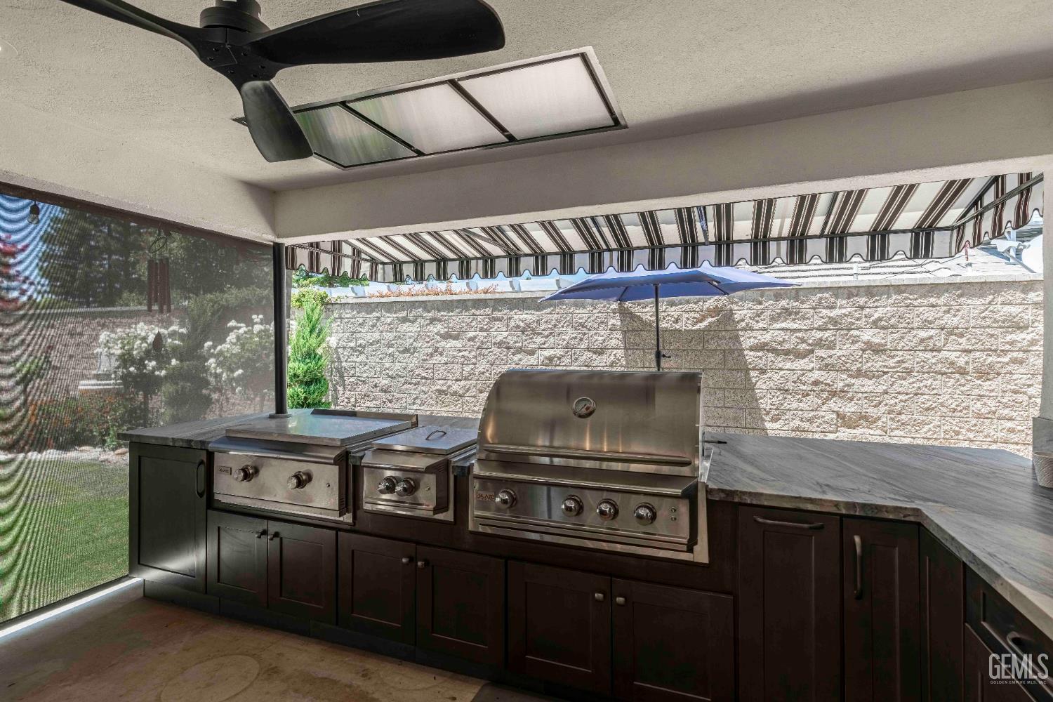 Undisclosed Address Bakersfield, CA 93314 - Photo 21 of 49 a kitchen with stainless steel appliances granite countertop a stove and a sink