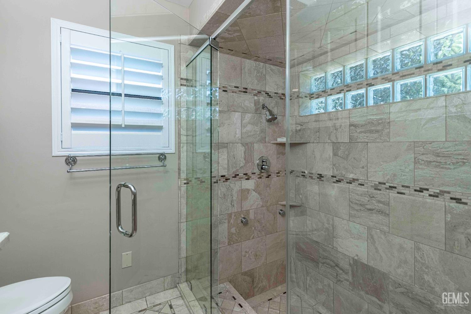 Undisclosed Address Bakersfield, CA 93314 - Photo 38 of 49 a bathroom with a shower