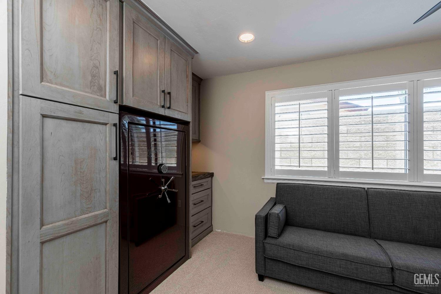 Undisclosed Address Bakersfield, CA 93314 - Photo 40 of 49 a living room with furniture and windows