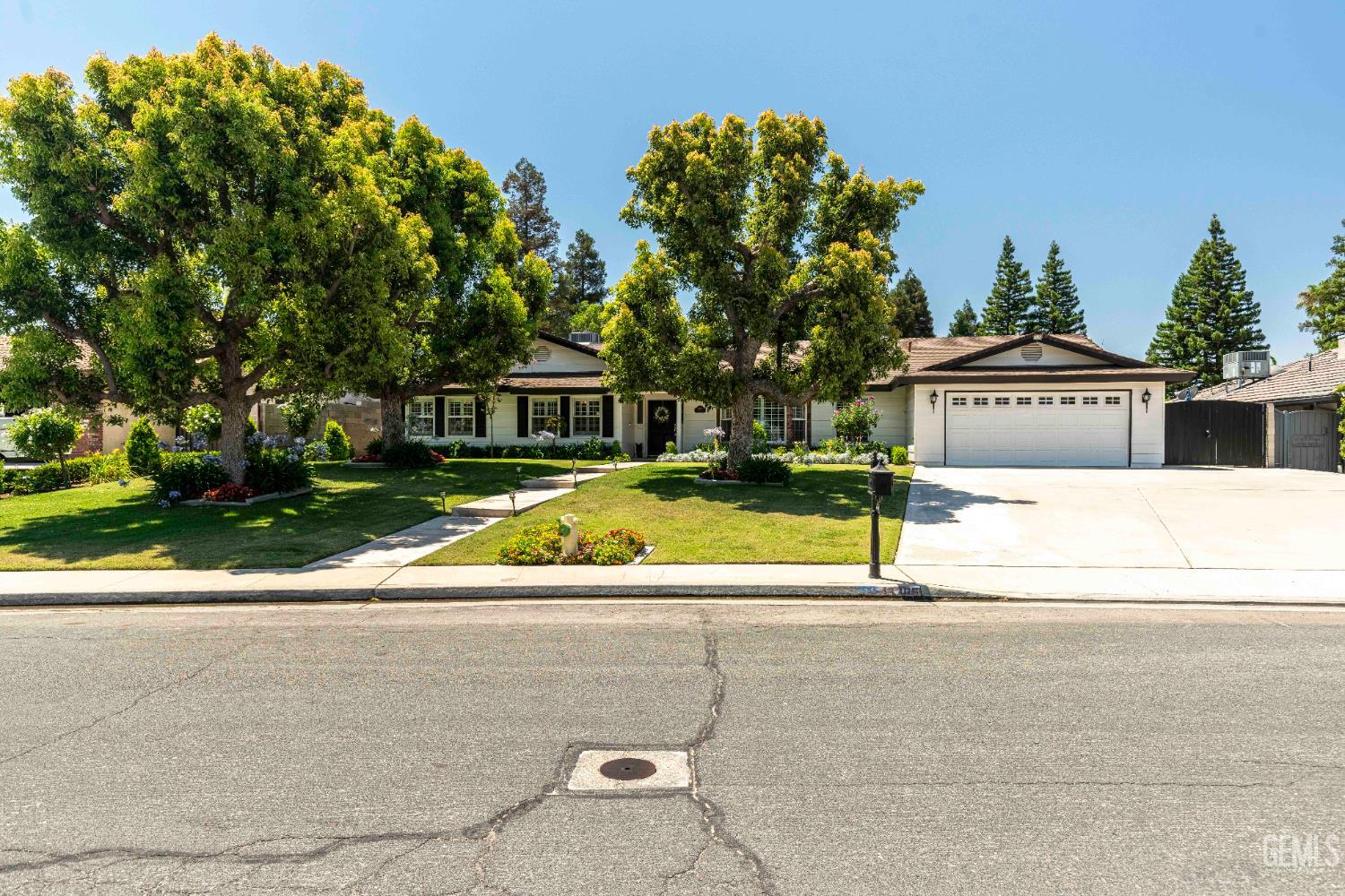 Undisclosed Address Bakersfield, CA 93314 - Photo 48 of 49 a view of swimming pool with outdoor seating and house in the background