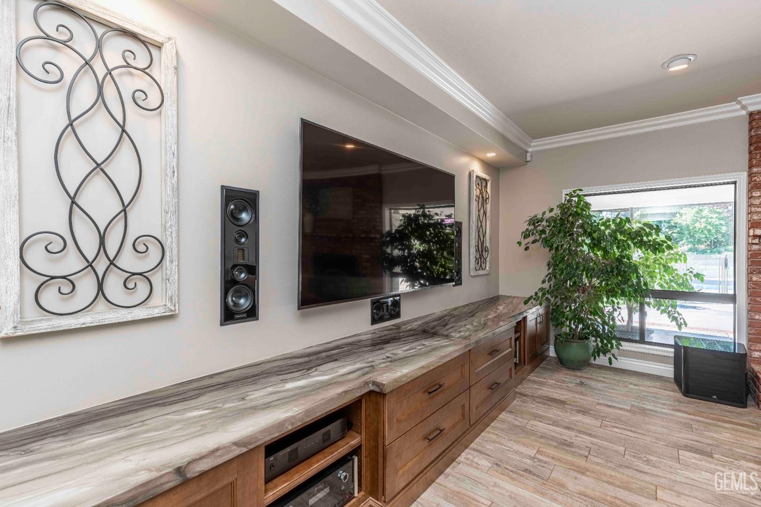 Undisclosed Address Bakersfield, CA 93314 - Photo 10 of 49 a bathroom with a sink and a large mirror