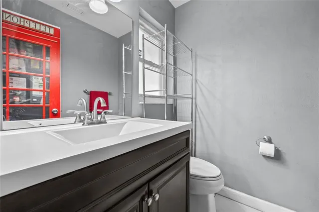 a bathroom with a sink and a toilet