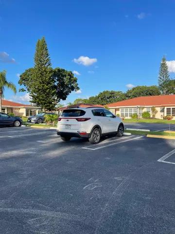 a view of a golf course with a lake