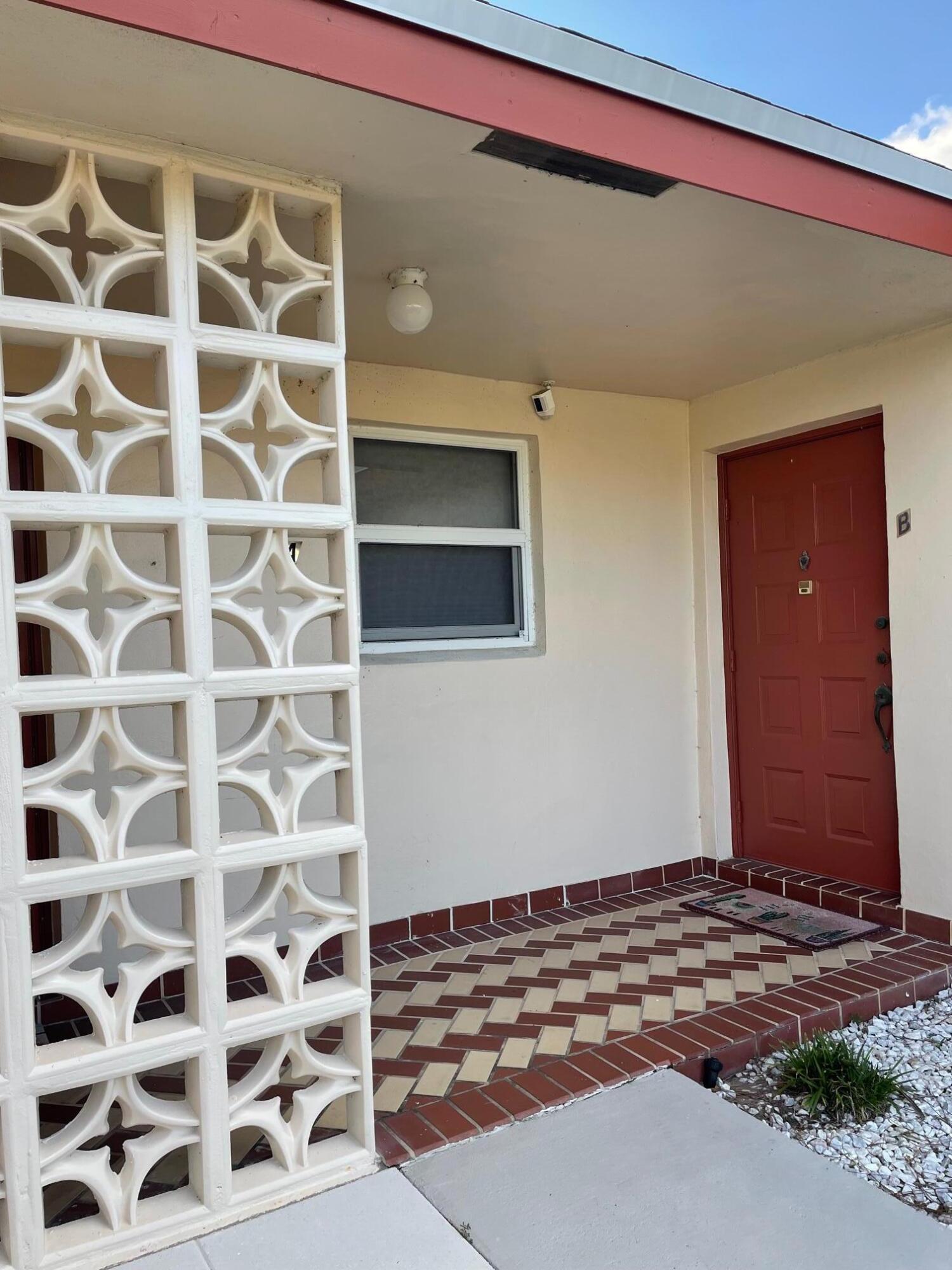 4675 Northwest 3rd Court, Unit B Delray Beach, FL 33445 - Photo 24 of 28 a view of a door
