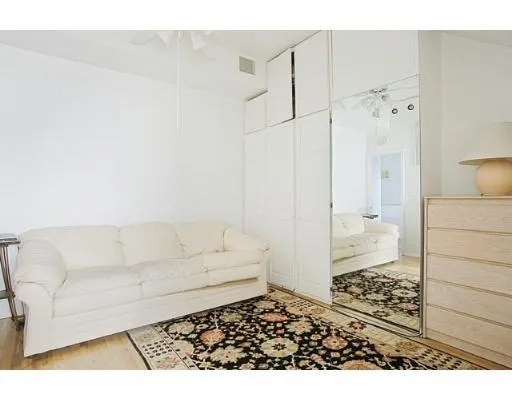 a living room with a couch and a coffee table