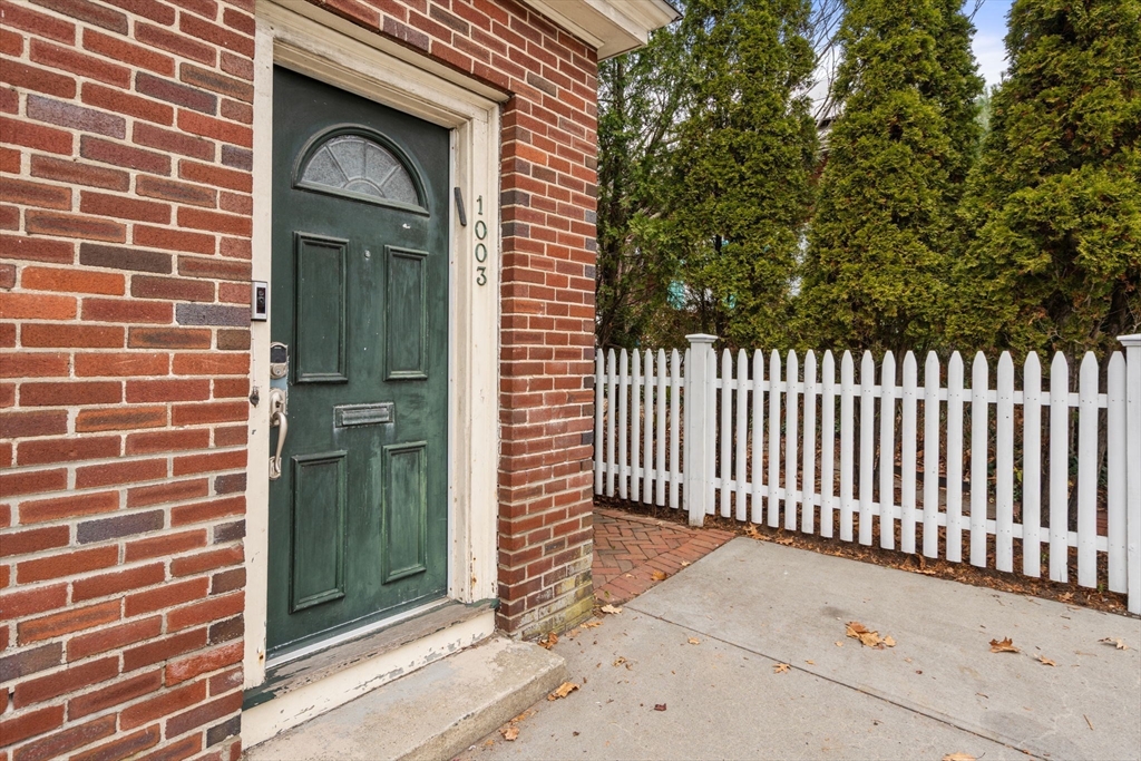 1003 Chestnut Street, Unit 1003 Newton, MA 02464 - Photo 17 of 28 a view of a door and brick wall