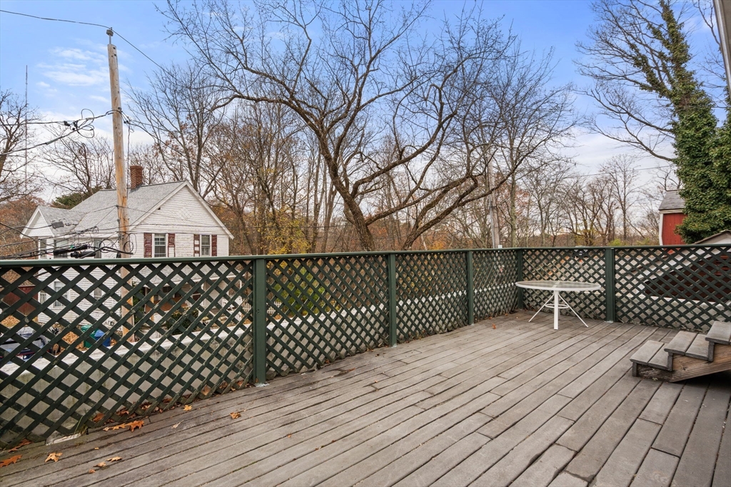 1003 Chestnut Street, Unit 1003 Newton, MA 02464 - Photo 4 of 28 a balcony with wooden floor
